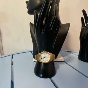 Timex Indiglo Gold Tone Stretch Band Watch White Dial Arabic Numerals Date 30M